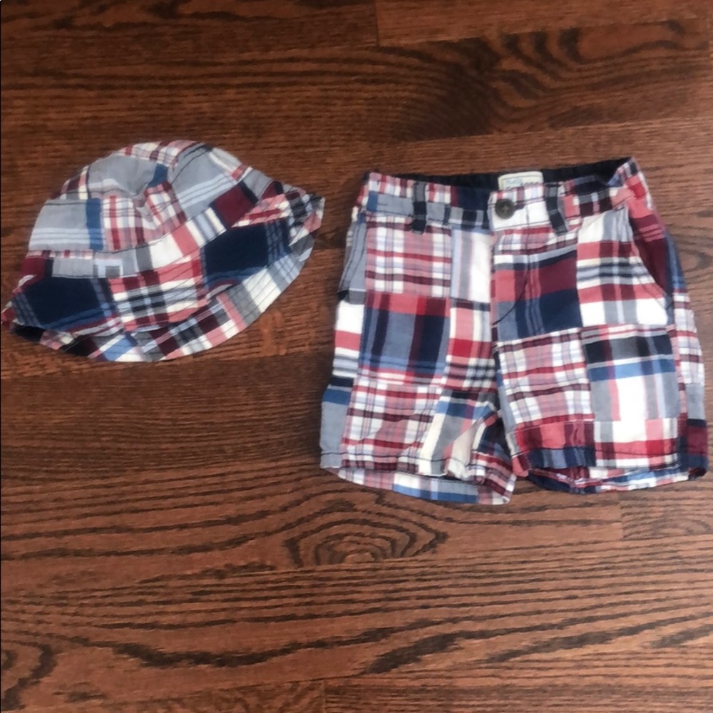 Red, white, and blue shorts and hat
